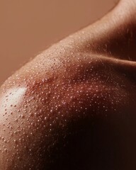 Fototapeta premium A woman's back is wet and covered in small white beads