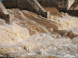 turbid water flow in to river