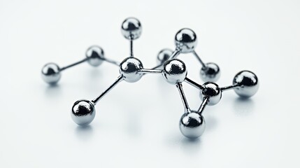 Fototapeta premium A close-up of a silver molecular structure on a white background.