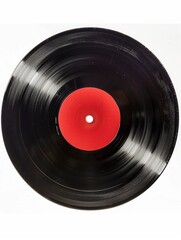 Fototapeta premium A black record with a red circle on it