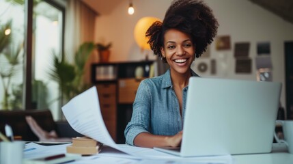 Smiling Woman Working on Laptop at Home Office Desk