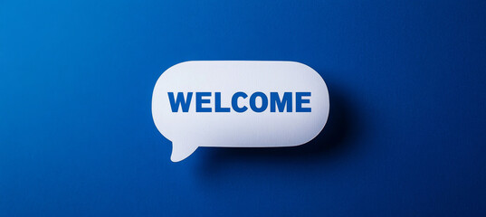 A minimalist "Welcome" message inside a white speech bubble on a vibrant blue background, conveying a friendly and modern design.
