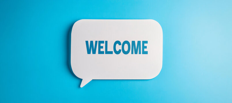 A minimalist "Welcome" message inside a white speech bubble on a vibrant blue background, conveying a friendly and modern design.
