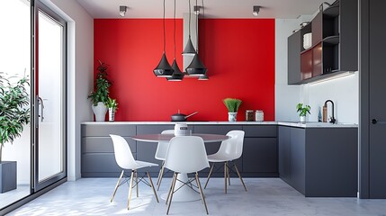 A bright, modern kitchen with a red feature wall, hanging pendant lights, floating grey cabinets, and circular dining table, evoking calmness and simplicity