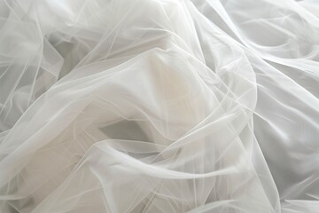 Close-up view of white fabric with subtle texture, slightly wrinkled and blurred background. Fabric has a smooth surface, completely covering frame. Ideal for fashion, textile, or design projects.