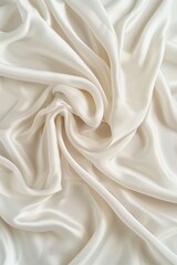 Obraz premium Close-up of white fabric with soft folds and gray background. Natural patterns resemble subtle texture. Suitable for design projects in fashion industry.