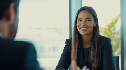 Obraz premium Woman job candidate in a job interview / business meeting / working professionals