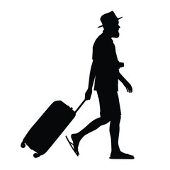 Silhouette of a tourist walking with luggage