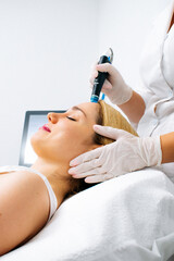 A dermatologist performs a hydro peel facial, highlighting advanced skin therapy for rejuvenation....