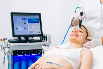 A dermatologist performs a hydro peel facial, highlighting advanced skin therapy for rejuvenation....