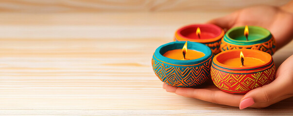 Handdecorating diyas with vibrant patterns, blending tradition and creativity for Diwali festival celebration, cultural harmony in art