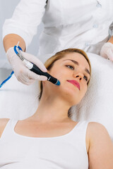 A dermatologist performs a hydro peel facial, highlighting advanced skin therapy for rejuvenation....