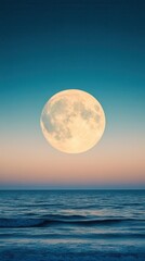 Dramatic moonrise over ocean horizon