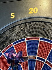 180 points in the soft dart board. Three triple 20s. Highest throw in darts