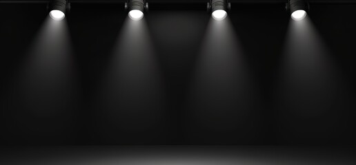 Four spotlights illuminate a dark stage, creating a dramatic and mysterious atmosphere. Perfect for presentations, concerts, or other events.