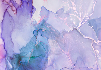 Beautiful abstract fluid art featuring shades of purple and blue with delicate gold accents created...