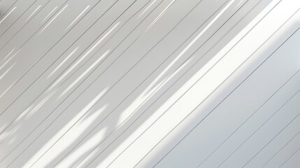 Fototapeta premium A white wall with shadows of window panes.