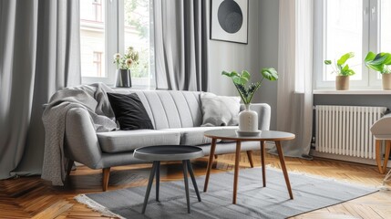 Stylish Scandinavian Home Interior with Grey Sofa and Retro Table