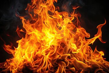 Fototapeta premium up stock photo of a blazing fire flame with swirling smoke surrounded by vibrant flames set against a black background Perfect for design projects needing copyspace and creating a mesmerizing effect