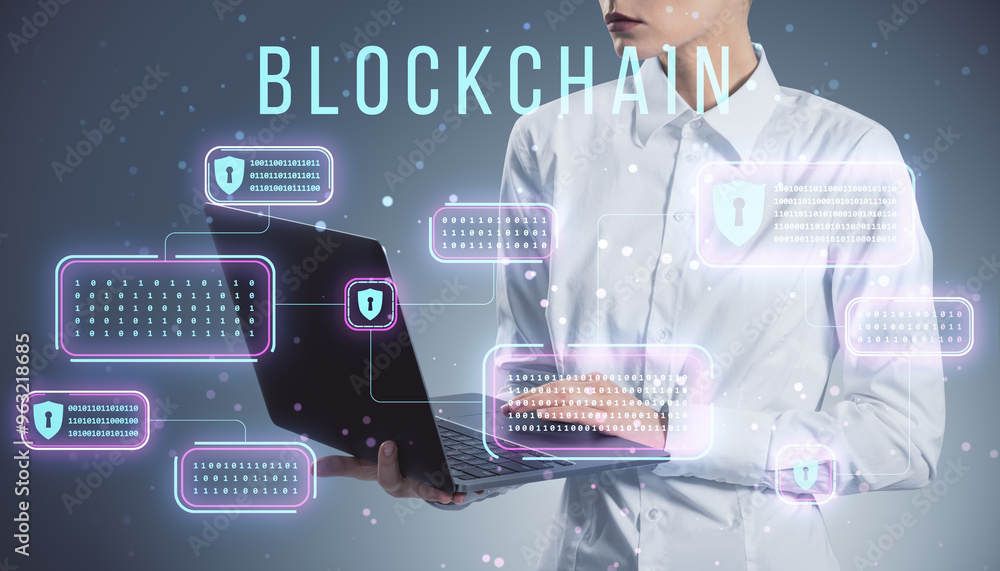 Poster person holding a laptop with blockchain security holograms on a digital interface background.