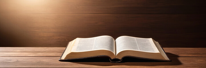 Obraz premium Open Bible on a weathered wooden surface with generous text area. Ideal for religious content, presentations, and worship. Panoramic design. Made with generative AI technology