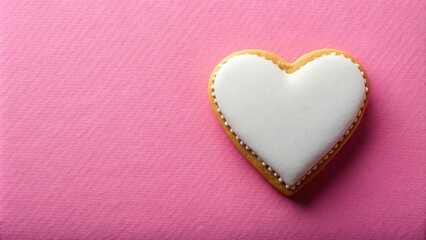 Fototapeta premium Heart shaped cookie with sugar icing on a pink paper background, delicious, paper, dessert, background, Valentine's Day, romantic, holiday, bakery, tasty, celebration, sugar icing