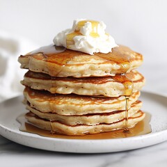 Stack of Buttermilk Pancakes Topped with Whipped Honey