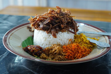 Nasi Krawu a signature dish from Surabaya, Indonesia