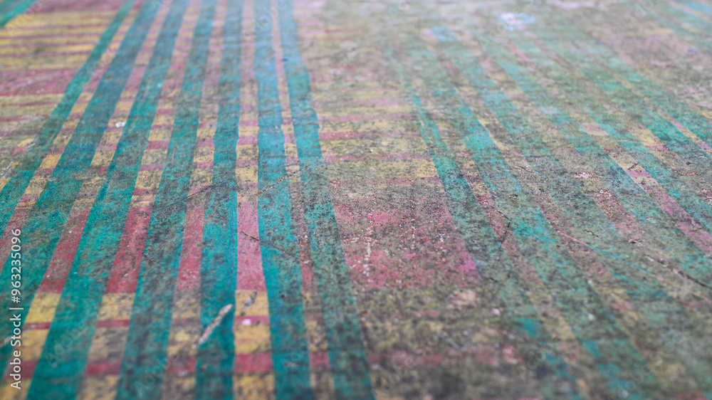 Poster close-up view of a weathered wood surface with colorful stripes. detail of striped colorful pattern 