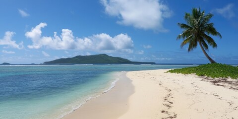 Fototapeta premium Sandy tropical beach with an island in the background.