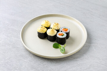 delicious fresh baked sushi roll with crab mayonnaise Philadelphia cheese.