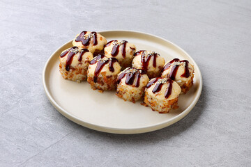 delicious fresh baked sushi roll with crab mayonnaise Philadelphia cheese.