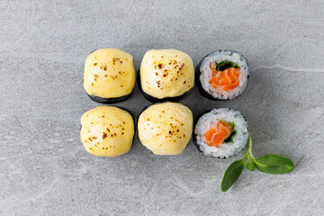 delicious fresh baked sushi roll with crab mayonnaise Philadelphia cheese.