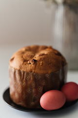 Easter. Easter cake and Easter eggs on a plate. Traditional Ukrainian Easter food. Christian holiday.