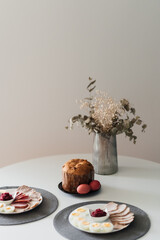 Easter. Easter cake and Easter eggs on a plate. Traditional Ukrainian Easter food. Christian holiday.