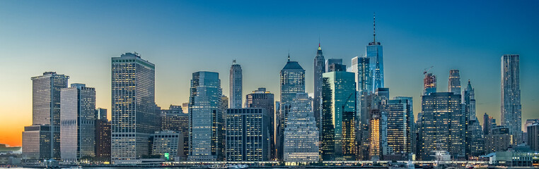 scenic view from Brooklyn harbor side to skyline of Manhattan, New York