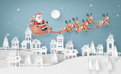 Santa Sleigh Flying Over Snowy Christmas Town at Night