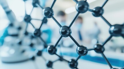 A close up of a black molecule with a blue background