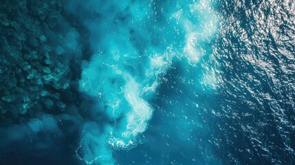 Tropical sea seen from above with blue surface and movement.