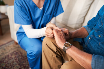 Holding hands, nurse and closeup in home for support, empathy and palliative care for healthcare....