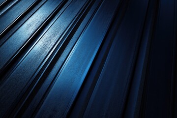 Obraz premium Abstract blue metallic stripes. This image is ideal for backgrounds, website headers, or as a modern, industrial design element.