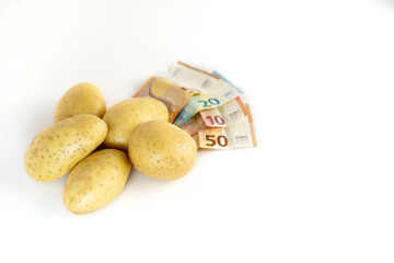 Set of potatoes and euro banknotes. Concept of price increase, expensive