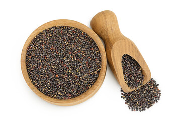 black quinoa in wooden bowl isolated on white background. Top view. Flat lay