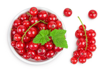 Red currant berries in a ceramic bowl with leaf isolated on white background. Top view. Flat lay