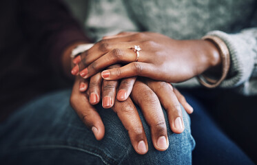 Couple, compassion and bonding with holding hands for assistance, help and grief in home. Married...