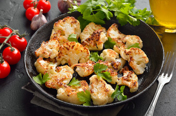 Fried cauliflower with herbs and spices