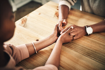 Couple, compassion and support with holding hands for assistance, help and grief in home. Married...