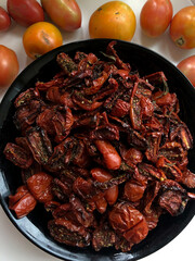 Top-Down View of Dried and Fresh Tomatoes in Vibrant Colors