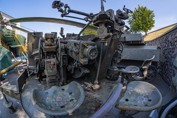 Supplies of weapons for Ukraine. Ukrainian artillery, detail of weapons Russian-Ukrainian war. Part of the weapon in close up. Military khaki coloring. Metal gun metal. New guns artillery