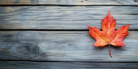 Fototapeta premium Autumn leaf on wooden background with copy space. AI generated illustration.